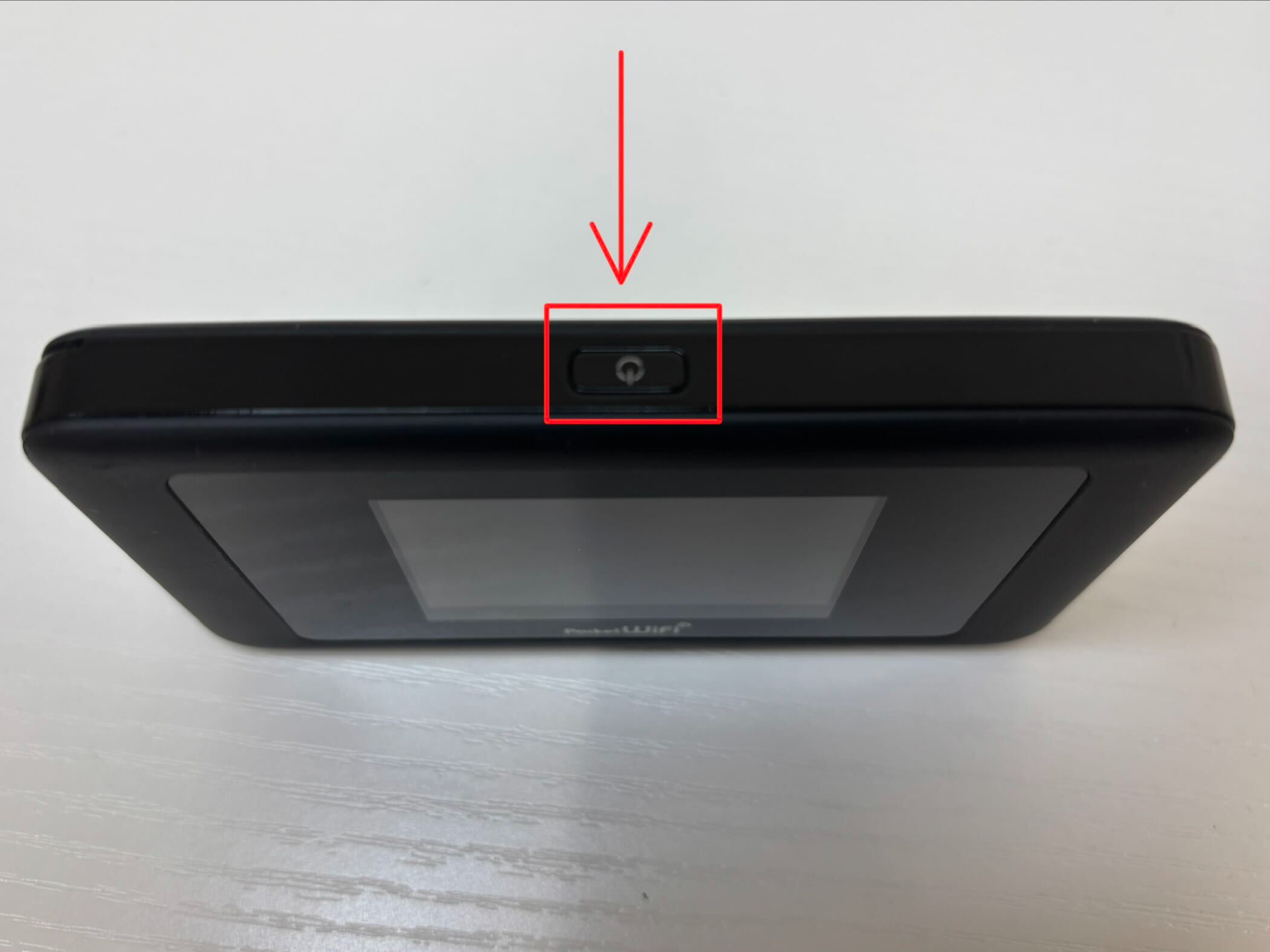 Power button on the top edge of the eConnect Japan Pocket WiFi router